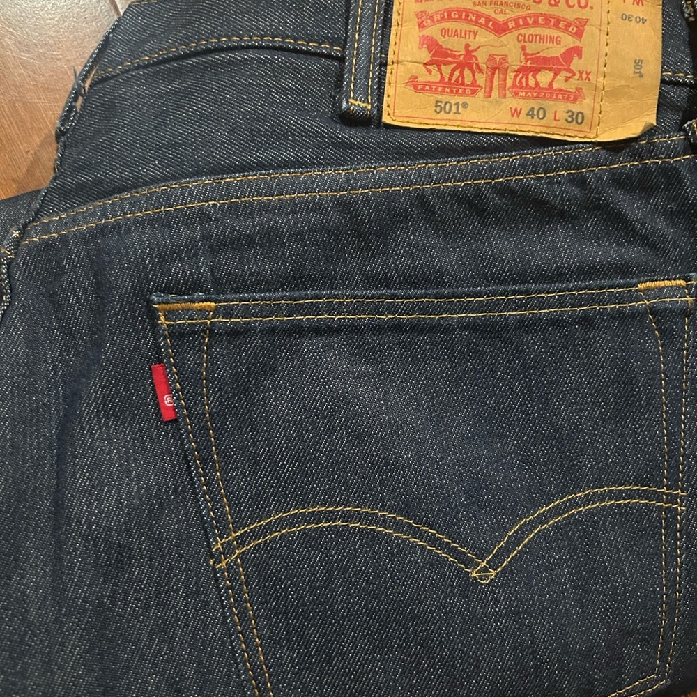 Levi's Blue Straight Jeans with Iconic Red Tab and Contrast Stitching